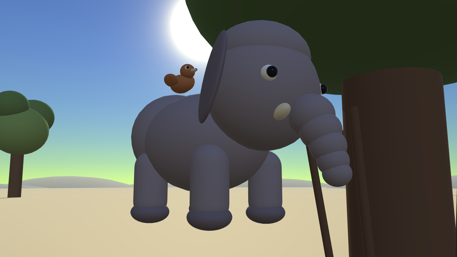 Trunks the elephant calf, with Pip the oxpecker on his shoulder